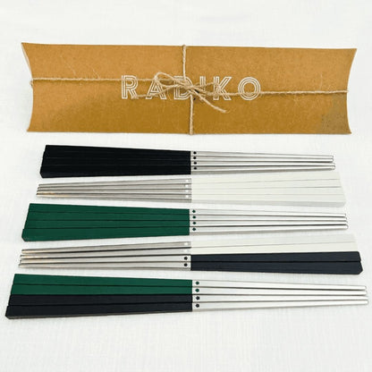 Radiko reusable chopsticks set featuring modern square handles in black, white, and green with metallic silver tips and kraft pillow box packaging.