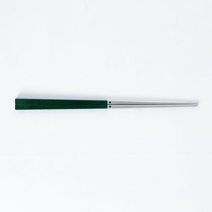 Radiko 316 stainless steel chopsticks with wood-grain handles in green, on a white background