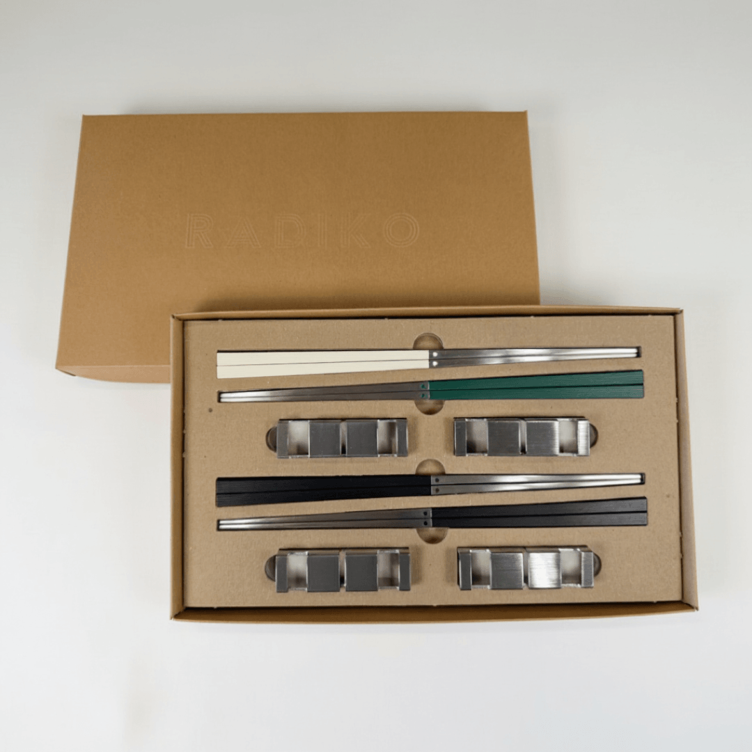 Radiko 4-set stainless steel chopsticks in white, green, and black with flatware rests, in a kraft gift box with debossed logo