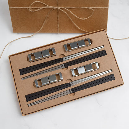 4 sets of 316 stainless steel chopsticks with black handles+304 stainless steel utensil rest s in the radiko 100% recyclable package brown Kraft box on a white background