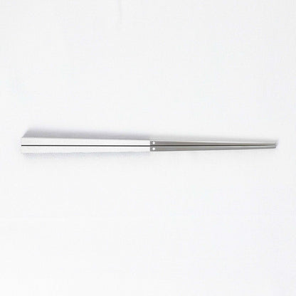 Radiko 316 stainless steel chopsticks in white with wood-grain textured square handles and metallic silver tips.