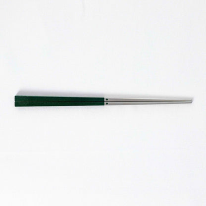 Radiko 316 stainless steel chopsticks in dark green with wood-grain textured square handles and metallic silver tips.