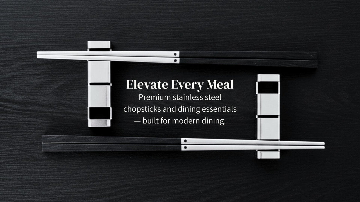 Premium 316 stainless steel chopsticks and luxury metal chopstick rests arranged symmetrically on a dark textured wood tabletop.