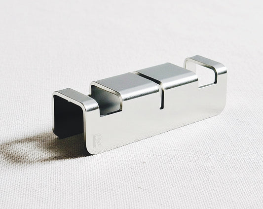 Radiko 304 stainless steel utensil rest in silver with white background 